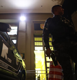 Policiais da Rota participaram na sexta-feira das prisões de Allan e de Marcos, os dois primeiros detidos levados à sede do DHPP  Foto: Daniel Teixeira / Estadão